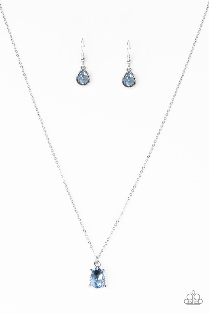 Featuring a regal teardrop cut, a radiant blue gem swings from the bottom of a dainty silver chain, creating a timeless pendant below the collar. Features an adjustable clasp closure.

 Sold as one individual necklace. Includes one pair of matching earrings. Blue Gem Necklace, Paparazzi Accessories Jewelry, Gem Necklace, Paparazzi Accessories, Blue Gems, Blue Necklace, Paparazzi Jewelry, Dainty Necklace, Necklace Earring Set