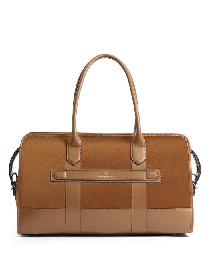 When the country gent heads off on his hols, he needs a holdall that looks the part. Setting a new standard for staycations and jet setting, the Hampstead is a classy suede and leather number with room enough for a mini breaks worth of clothes and toiletries. At the airport, slip the external strap over your wheely suitcase handle and leg it to the lounge in style. Crafted from leather and suede: made with the finest materials Internal zipped and open pockets: keep things safe and tidy Two carry Elegant Brown Travel Bag With Gold-tone Hardware, Formal Textured Leather Duffle Bag, Luxury Brown Duffle Bag With Leather Trim, Luxury Brown Duffle Bag For Formal Occasions, Brown Luxury Duffle Bag For Formal Occasions, Luxury Textured Leather Travel Bag For Formal Occasions, Luxury Brown Formal Duffle Bag, Elegant Textured Leather Duffle Bag For Formal Occasions, Elegant Business Duffle Bag With Textured Leather