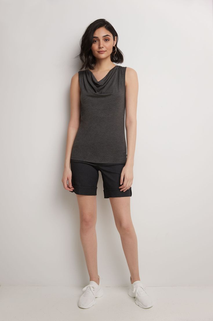 You’re a woman who likes to keep things simple, and this laidback philosophy sometimes extends to your wardrobe choices. That’s why you’ll love this sumptuously soft sleeveless top with its gently draped cowl neckline. Designed in a stretchy knit blend, this is an appropriate choice for anything from casual downtime dressing to your nine-to-five grind. It’s minimal but sophisticated and works well as a solo act or layered under a jean jacket or cardigan. Made with soft, lightweight knit for comf Knit Cowl, Cowl Neckline, Lightweight Knit, Spandex Fabric, Soft Knits, Cowl Neck, Jean Jacket, Basic Tank Top, Philosophy