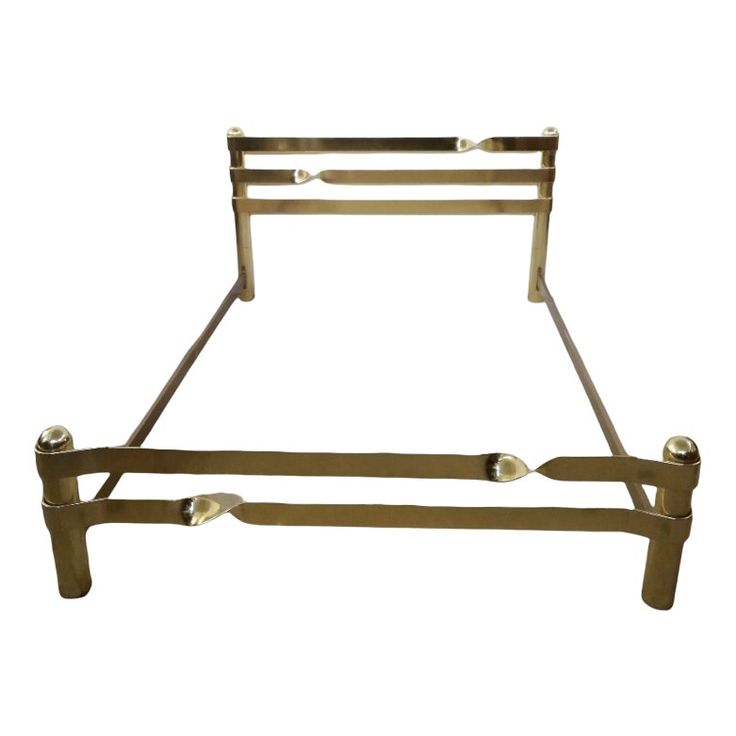 a metal bed frame with four legs and two rails on each side, against a white background