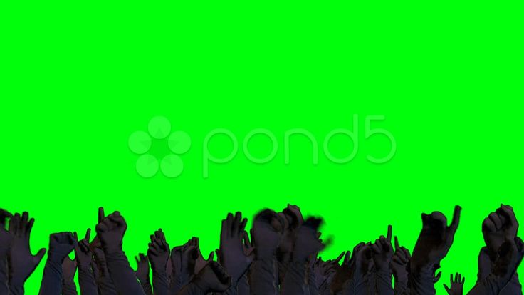 many people raising their hands up in the air against a green background with an inscription pond5