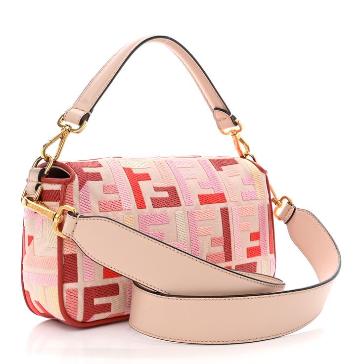 This is an authentic FENDI Canvas Vitello King FF Embroidered Baguette in Rosa Quarzo, Bloody Mary and Multicolor. This stylish shoulder bag is finely crafted of multicolored Fendi FF canvas with a light pink background. The bag features red leather trim, a pink leather top handle, an optional leather shoulder strap, and vibrant gold-tone hardware. The crossover flap opens with a gold-tone Fendi FF logo clasp to a light pink fabric interior with a zipper pocket. Fendi Crossbody Bag, Fendi Baguette Bag, Baguette Bags, Fendi Shoulder Bag, Ff Logo, Stylish Shoulder Bag, Fendi Bags, Pink Fabric, Blue Velvet