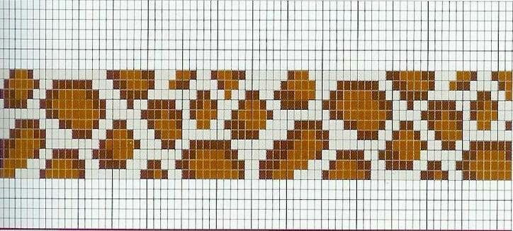 a cross stitch pattern with brown and white squares