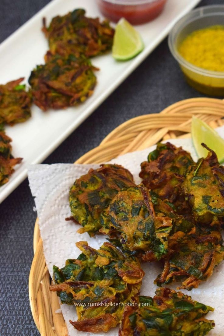 some food is sitting on a plate and ready to be eaten with other dishes in the background