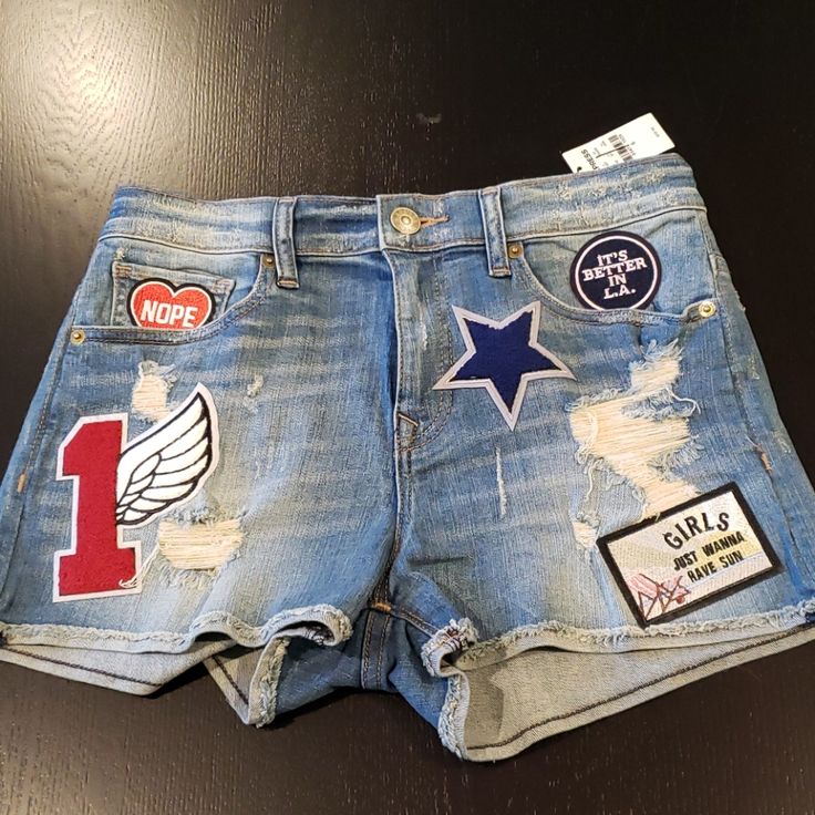 Brand New With Tags! Express Distressed Denim Shorts With Patches! Extremely Cute! Never Worn And Cleaning My Closet. Retail $59.99. Open To Your Offer And I Will Ship Asap Denim Shorts With Patches, Cotton Medium Wash Bottoms With Patches, Casual Denim Blue Bottoms With Patches, Trendy Denim Bottoms With Patches, Cutoff Denim Shorts With Patches, Casual Cutoff Jean Shorts With Patches, Casual Patched Jean Shorts, Casual Denim Shorts With Patches, Trendy Summer Bottoms With Patches