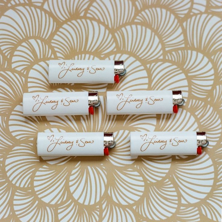 four white batteries sitting on top of a table