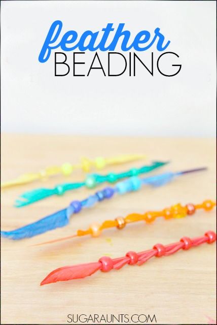 the words feather beading are in front of several different colored beads on a table