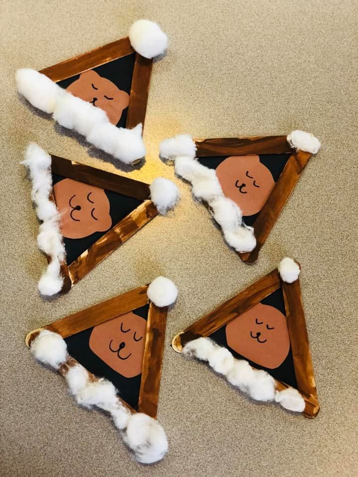 four pieces of paper with santa claus's face on them