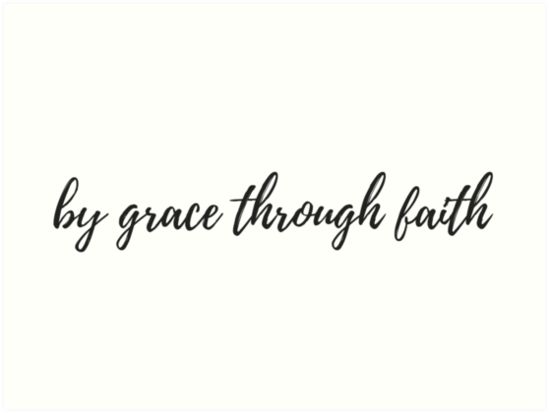 the words by grace through faith written in black ink