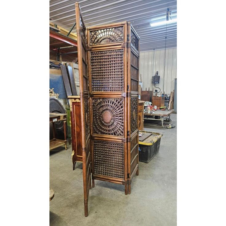 an old wooden room divider in a shop