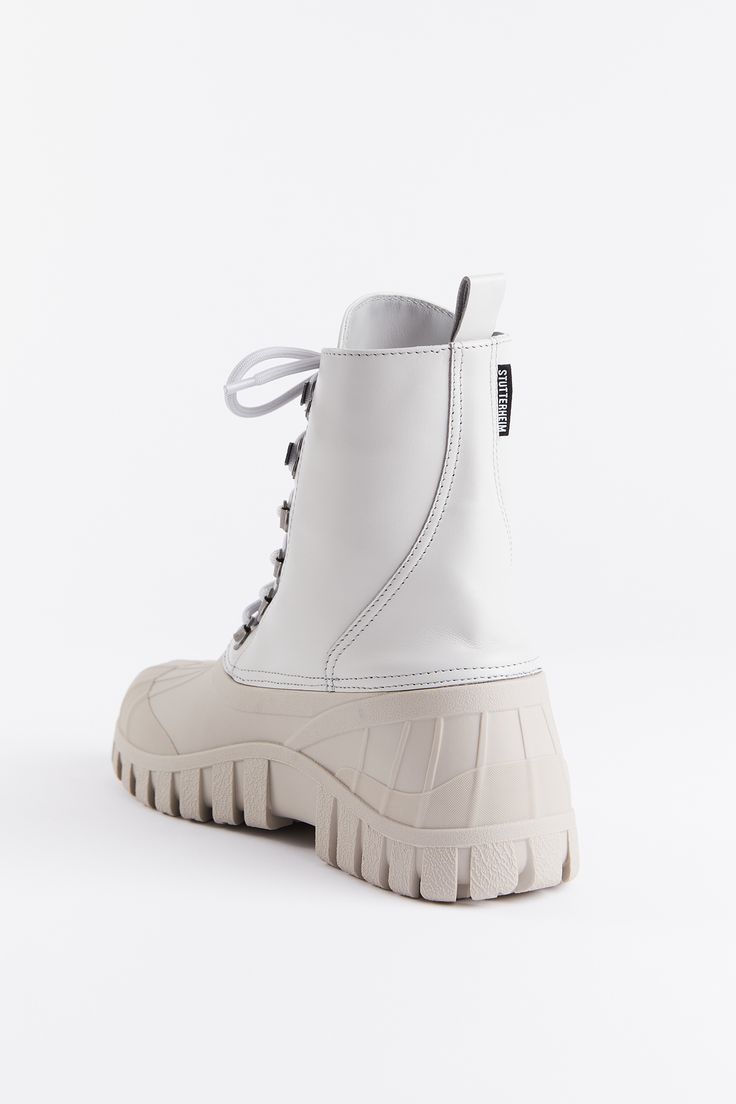 Patrol Boot Leather Ivory | STUTTERHEIM US Casual White Lace-up Hiking Boots, White High Ankle Outdoor Boots, White High Ankle Boots For Outdoor, Lace-up Waterproof Boots With Lug Sole For Streetwear, White Leather Moto Boots For Streetwear, White High-top Combat Boots With Lug Sole, White Leather Weatherproof Boots, Outdoor Lace-up Platform Boots With Rubber Sole, Sporty Lace-up Boots With Lug Sole