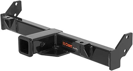 the back end of a truck with two brackets on each side and an orange arrow in the center