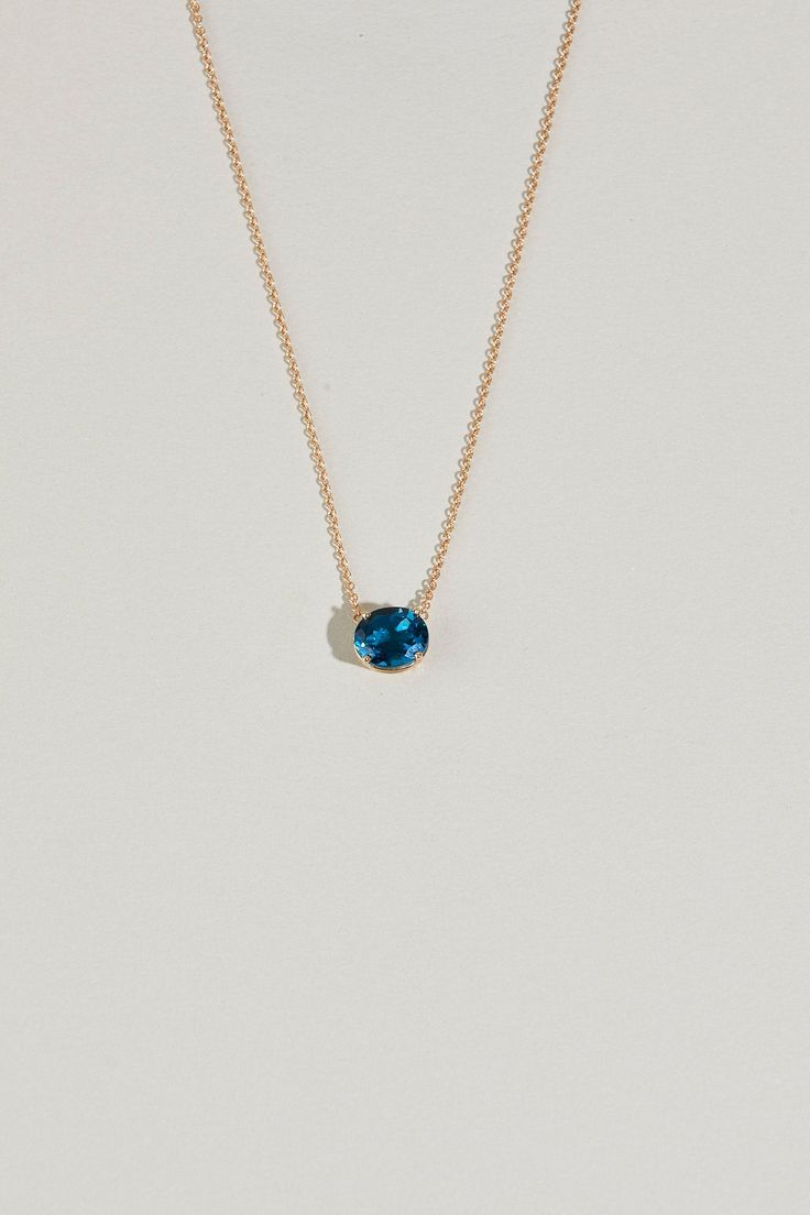 METAL14kt Yellow Gold12x10mm basket setting + 1.5mm cable chain STONE12x10mm Oval Speckled SapphireApprox. 6.85ct This striking piece is perfect worn as a solo statement, and can be beautifully layered with the JP BALL CHAIN. Blue Topaz Necklace, Topaz Necklace, Ball Chain, Cable Chain, Chain Lengths, Blue Topaz, Topaz, Color Pop, Pendant Necklace