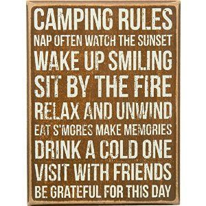 a wooden sign that says camping rules