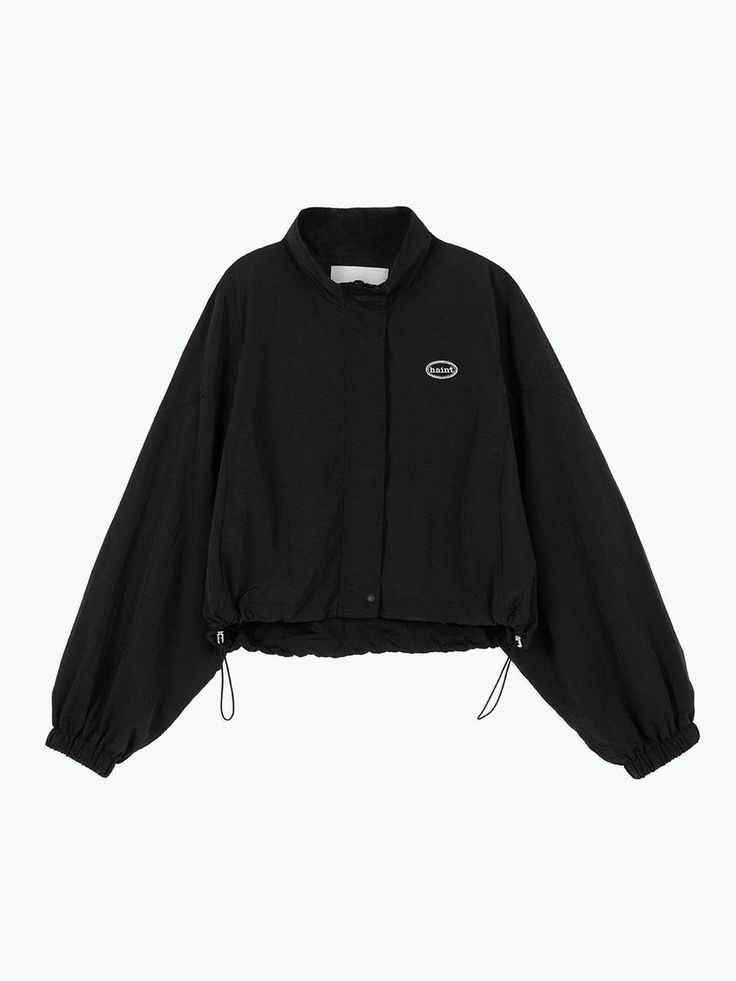 This is a modern and casual windbreaker jumper by HAINT that is made out of high quality and sturdy fabric. With refined design detail and trendy mood, you can style it for your clean and minimal daily outfit.- Sturdy nylon 100% fabric- Cropped silhouette- Chest logo embroidery detail- Adjustable string on the hem- Mesh lining with high air permeability Black Nylon Outerwear With Elastic Cuffs, Techwear Nylon Windbreaker For Work, Nylon Techwear Windbreaker For Work, Techwear Nylon Windbreaker With Ribbed Cuffs, Functional Nylon Windbreaker For Work, Techwear Windbreaker With Long Sleeves For Work, Techwear Long Sleeve Windbreaker For Work, Techwear Style Long Sleeve Windbreaker For Work, Modern Nylon Long Sleeve Track Jacket