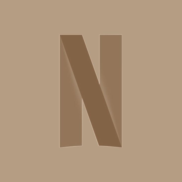 the letter n is made up of brown paper