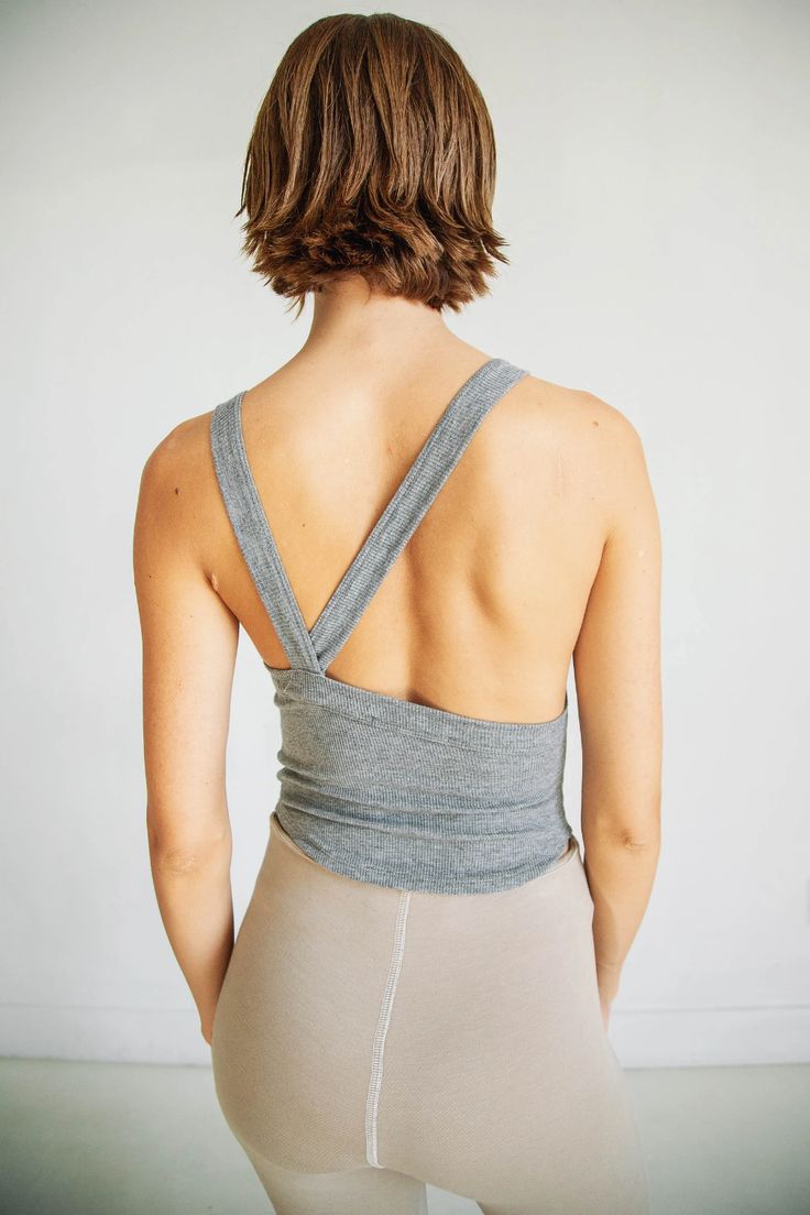 XIMENO TANK TOP HEATHER GREY – The Line by K Yoga Tank Top With Built-in Bra, Versatile Tops With Built-in Bra And Cross Back, Versatile Cross Back Tops With Built-in Bra, Casual Tops With Bra-friendly Scoop Back, Fitted Athleisure Tank Top With Adjustable Straps, Casual Cross Back Tank Top With Built-in Bra, Athleisure Tank Top With Built-in Bra, Spring Gym Tank Top With Adjustable Straps, Fitted Top With Seamless Construction And Cross Back