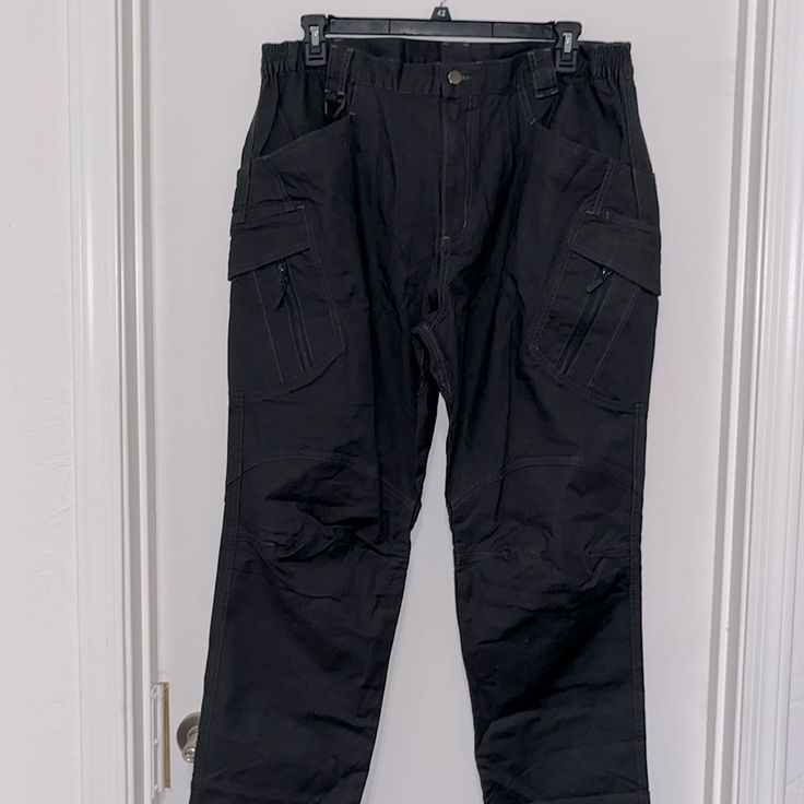 Nwt Tactical Multi Pocket Pants Charcoal 40w 32l Stylish, Fitness, Multi-Pocket, Scratch-Resistant, Wear-Resistant, No Deformation, Breathable, Hard To Crumple, Comfortable Material: 97 %Cotton, 3% Spandex Zipper Closure Appearance Fashion, Longitudinal Elastic Design, Thick And Flexible, Stretching And Comfortable Knee With Datrs Design, Ergonomic, Able To Adjust The Pants Type, Making It More Suitable For Wearing These Tactical Pants Are Particularly Suitable For Casual Activities, Shooting Wr Cargo Work Pants, Camo Men, Canvas Pants, Tactical Pants, Compression Pants, Vintage Polo Ralph Lauren, Camo Pants, Type Of Pants, Scrub Pants