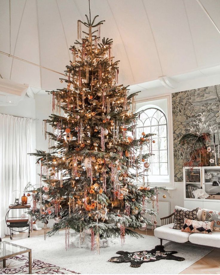 a decorated christmas tree in a living room