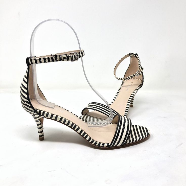 New With Box, New Used. Stripe-Printed Leather With Subtle Snake Embossing Defines A Breezy Ankle-Strap Sandal. 2 1/2" Heel Adjustable Ankle Strap With Buckle Closure. Leather Upper, Lining And Sole. Coach Sandals With Ankle And Heel Straps, Coach White Leather Sandals, Coach Heels With Ankle Strap, Coach Heels With Ankle And Heel Strap, Coach Heels With Ankle Strap And Heel Strap, White Leather Coach Sandals, Coach Elegant Formal Sandals, Elegant Coach Sandals For Formal Occasions, Coach Evening Sandals With Ankle Strap