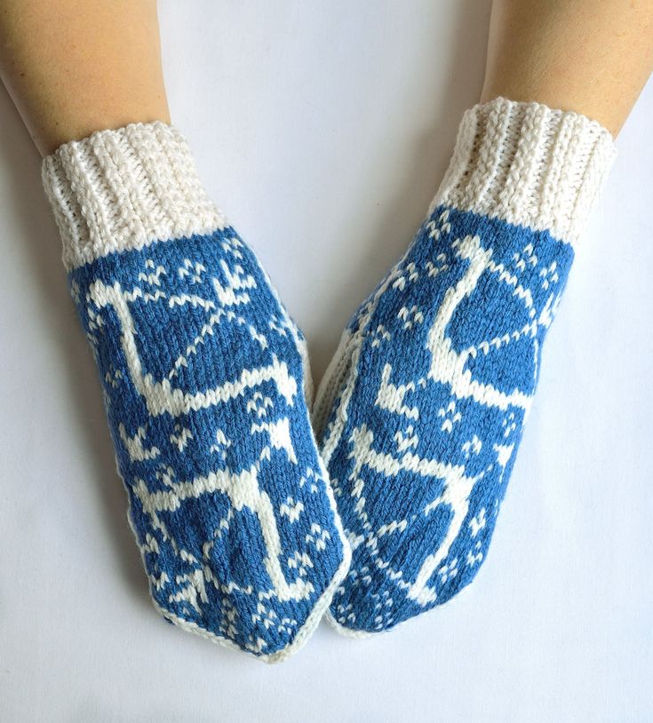 Blue & milk white, decorated in Zodiac's Sagittarius theme, warm women's mittens hand knitted with needles from wool - acrylic yarns. With also decorated mitten's palm side. Light and comfortable to wear. These cozy and soft Sagittarius mittens will warm you up in cold winter or autumn time. Accurately knitted from high quality yarns, so, mittens are durable and easy to maintain. Also it's available hand knit mittens, gloves or arm wearmers according to your idea or size. Fiber: wool - acrylic yarn. Care: hand wash at 30 degrees C. - lay flat to dry. SIZING: hand circumference at palm 9''(23cm), mitten length 10.5''(27cm). Scandinavian Winter Handmade Knitting Pattern, Handmade Winter Knitting Pattern For Crafting, Nordic Style Handmade Winter Knitting Pattern, Winter Crafting Knitting Pattern, Handmade Winter Crafts For Gifts, Handmade Crafts For Winter Gifts, Hand Knit Mittens, Women's Mittens, Sagittarius Zodiac