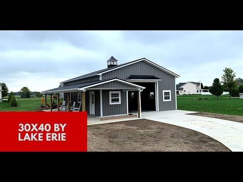 a small gray building with a red sign that says 30x40 by lake fire