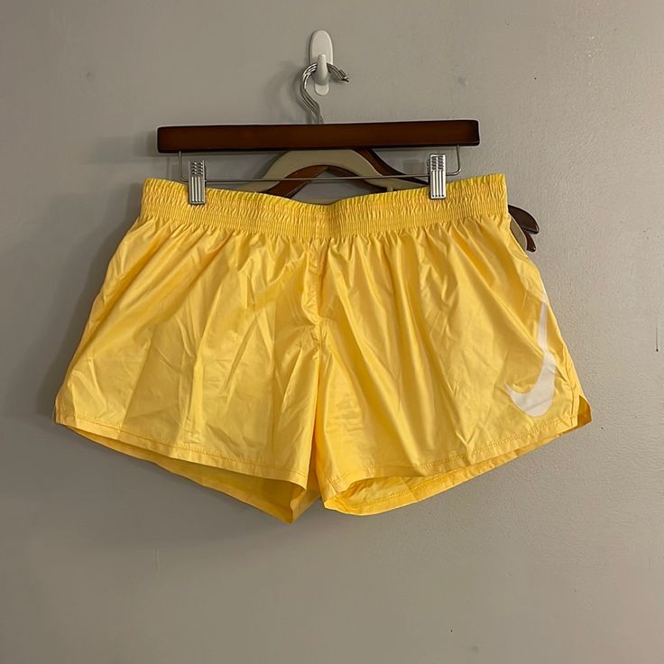 Nike Women’s Running Shorts Yellow/White Womens Us Large Never Worn New Without Tags Nike Athleisure Athletic Shorts For Beach, Nike Athleisure Beach Athletic Shorts, Nike Beachwear Shorts, Nike Athletic Shorts With Elastic Waistband For Beach, Nike Vacation Shorts, Nike Beachwear Bottoms For Summer, Nike Summer Beachwear Bottoms, Nike Beachwear Bottoms For Beach Season, Nike Casual Vacation Bottoms