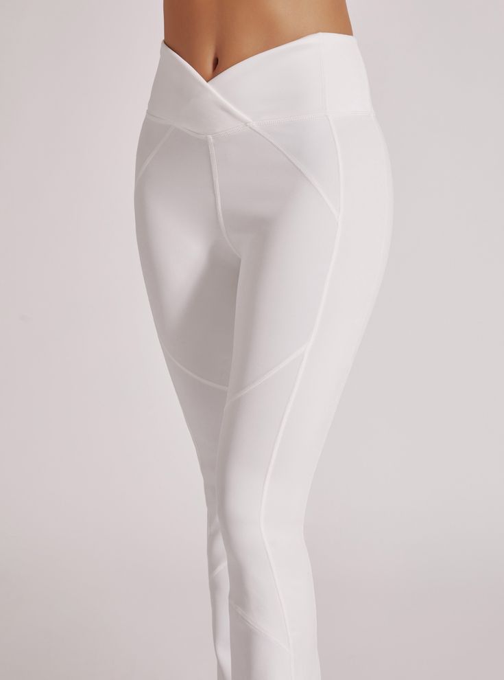 FEATURES & BENEFITS Back Zip Pocket In Seam 31" Leg Opening 10 1/2" High Rise FABRIC CONTENTS Self: 85% Nylon 15% Spandex Model is wearing size Small White Micro-elastic Tights, White Compressive Elastane Leggings, White 4-way Stretch Yoga Pants, White Activewear With Light Support And Stretch, White 4-way Stretch Leggings For Pilates, White Functional Yoga Pants, White Micro-elastic Elastane Leggings, White Sports Leggings With 4-way Stretch, White Sporty 4-way Stretch Leggings