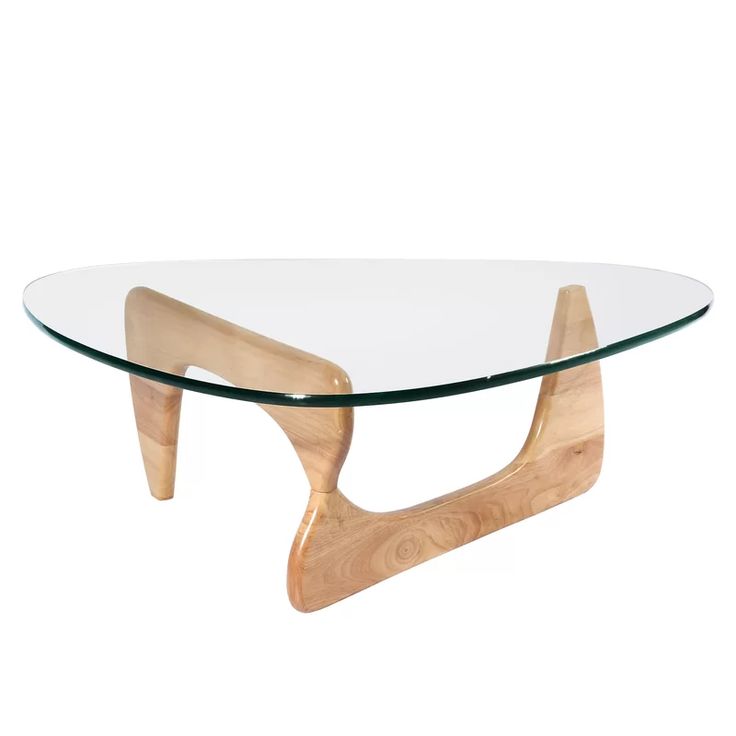 a glass and wood coffee table with an unusual shaped design on the top, against a white background