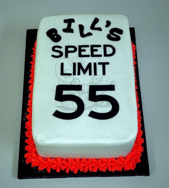 a birthday cake with the number 55 on it for someone's 65th birthday