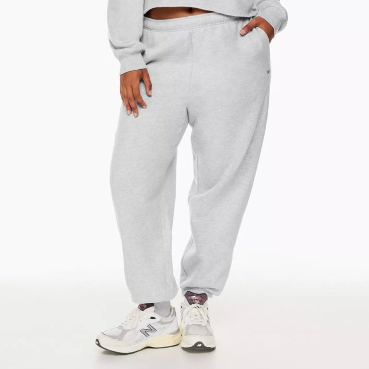 Tna Cozy Fleece Boyfriend Basic Sweatpant (2021 Version) Brand New, Never Worn! Color: Heather Chrome Cuffs At The Bottom, Tna Logo Embodied On The Left Side Has Pockets!! Cozy Joggers For Jogging, Fleece Pants For Loungewear, Fleece Pants For Loungewear And Athleisure, Fleece Pants For Loungewear In Athleisure Style, Fleece Pants For Athleisure Loungewear, Cozy Fit Fleece Bottoms For Loungewear, Fleece Bottoms With Comfort Waistband For Loungewear, Comfortable Fleece Bottoms For Loungewear, Comfort Waistband Fleece Bottoms For Loungewear