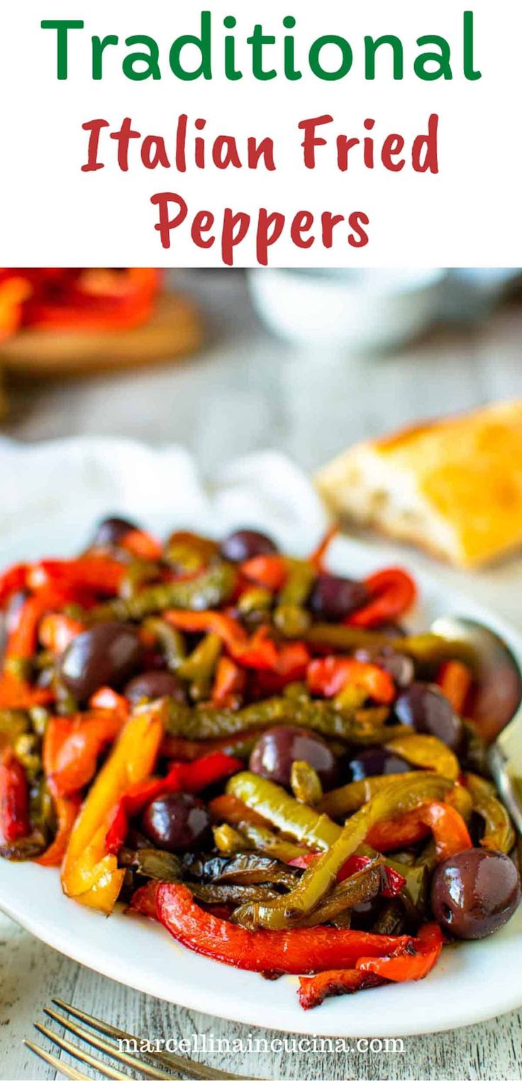 a white plate topped with black olives and peppers