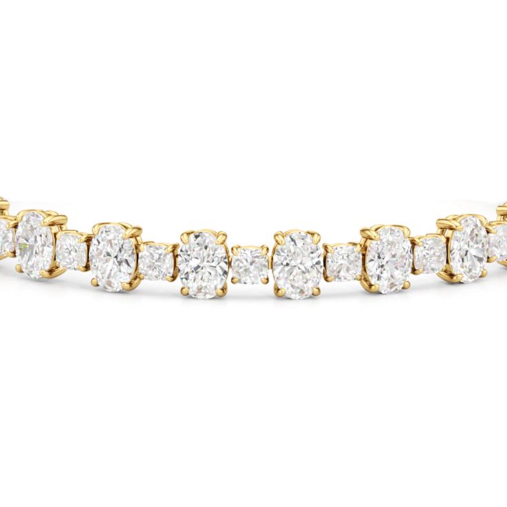 A remarkable find. This diamond tennis bracelet is something you can pass down from generation to generation. The pattern of alternating oval and cushion diamonds give this bracelet a specially stunning look. Fine Jewelry Oval Diamond Bracelet With Accents, Oval Diamond Bracelet With Diamond Accents, Oval Diamond Bracelet With Accents, Oval Diamond Bracelets With Diamond Accents, Oval Tennis Bracelet With Diamond Accents For Anniversary, Luxury Oval Tennis Bracelet With Diamond Accents, Oval Tennis Bracelet With Diamond Accents, Oval Diamond Bracelet For Anniversaries, Oval Diamond White Diamond Bracelet For Anniversary