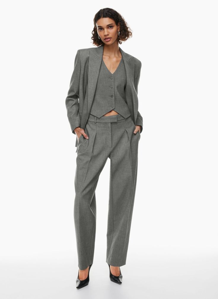 DENIRO VEST | Aritzia Versatile Fitted Blazer For Layering, Classic Vest With Hidden Button Closure, Fitted Notch Lapel Versatile Blazer, Chic Fitted Vest With Welt Pockets, Fitted Chic Vest With Welt Pockets, Chic Tailored Vest Outerwear, Fitted Vest For Workwear In Spring, Fitted Vest For Spring Workwear, Classic Workwear Vest For Fall