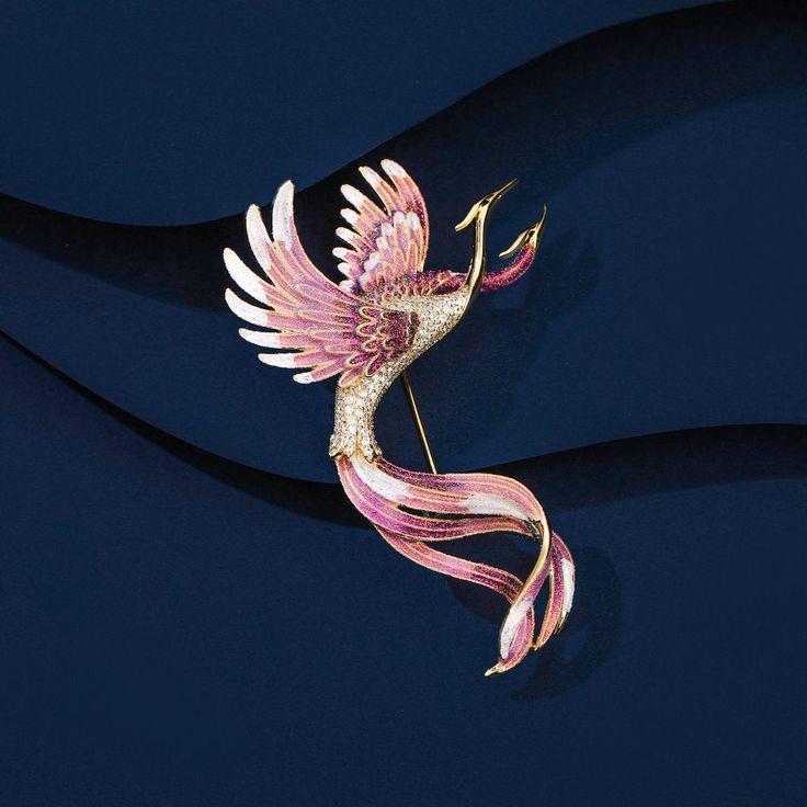 Description & Details The phoenix bird symbolizes immortality, resurrection and life after death, and in ancient Greek and Egyptian mythology it is associated with the sun god. • Material: High Quality Copper ∙ Enamel ∙ Cubic Zirconia• Finish: Hypoallergenic ∙ Gold Plating• Dimensions: 70 × 40 mm• All our work is custom made by hand with love Rhinestone Outfit, Phoenix Jewelry, Cute Whales, Fancy Gifts, Accessories Style, Wedding Brooch, Pattern Animal, Bird Brooch, Enamel Brooch