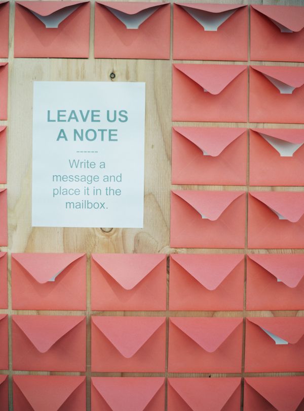 an instagramted post from the san diego wedding blog, featuring pink origami hearts