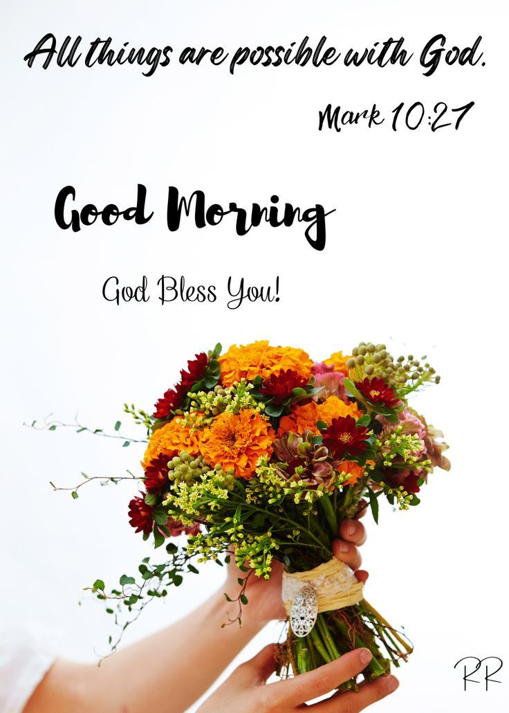 a woman holding a bouquet of flowers with the words, good morning god bless you