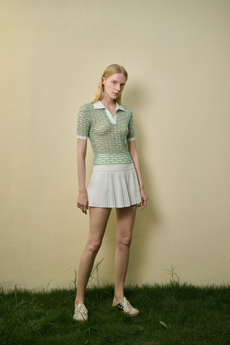 Lightweight knit Semi sheer Polo color Contrast trim Regular fit This light green, semi-sheer top features a classic polo collar, with white trim on the collar, cuffs, and hem for a fresh, stylish contrast. The breathable, lightweight fabric ensures comfort and ease, making it an ideal choice for pairing with a mini skirt. Embrace the sporty casual vibe with this versatile piece, perfect for any relaxed day out. Semi Sheer Top, Sporty Casual, Color Contrast, Everyday Dresses, Sheer Top, White Trim, Lightweight Knit, Event Dresses, Polo Collar