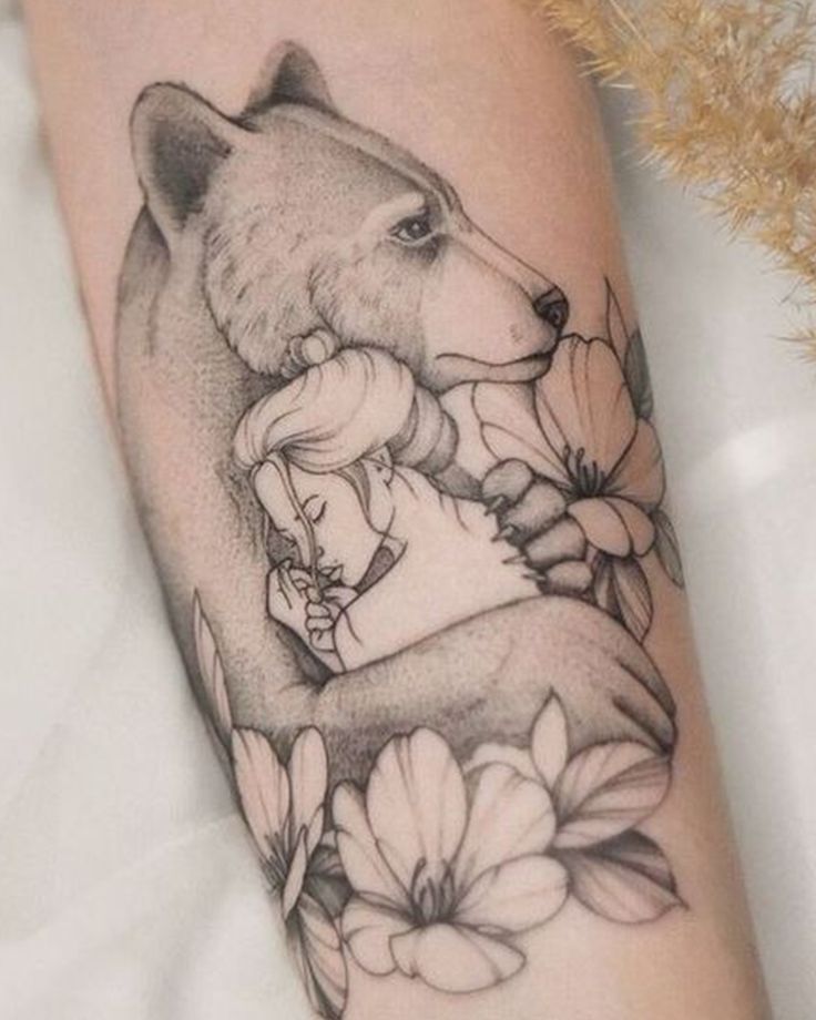 a black and white photo of a bear with flowers on it's leg, next to a plant