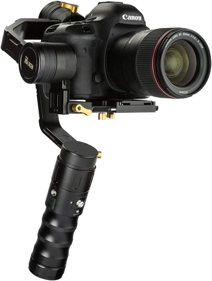 a camera with a tripod attached to it's body and lens on the arm