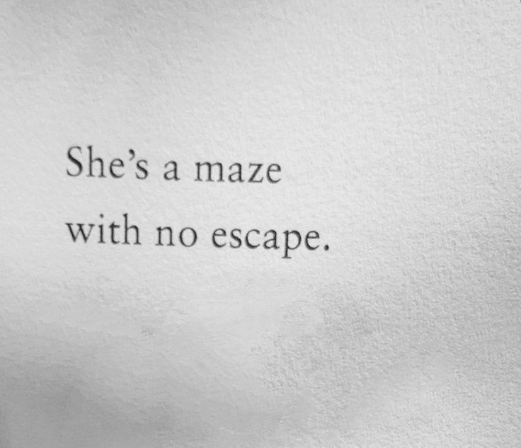 the words she's a maze with no escape written in black ink on white paper