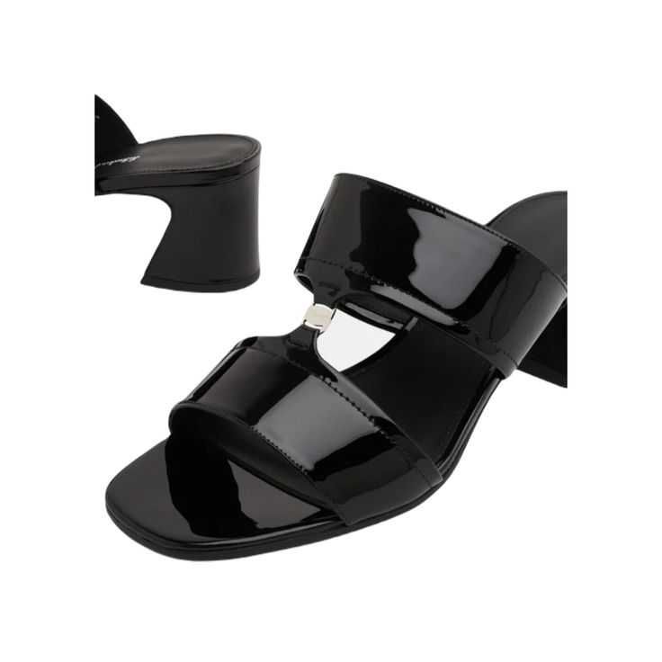 The Ferragamo Tot 55 Women's Sandals in Black are the epitome of sophistication and modern charm. Featuring a block heel for stability and style, these sandals showcase a double-strap silhouette elegantly joined together with a slim Vara chain. Crafted with meticulous attention to detail, they offer both comfort and luxury, making them a versatile choice for any occasion. Whether paired with a cocktail dress for an evening event or dressed down with jeans for a casual outing, these sandals add a touch of glamour to every step. Women Men Shoes, Sandals Black, Dressed Down, Women's Sandals, Black Sandals, Salvatore Ferragamo, Block Heels, Womens Sandals, Bags Designer