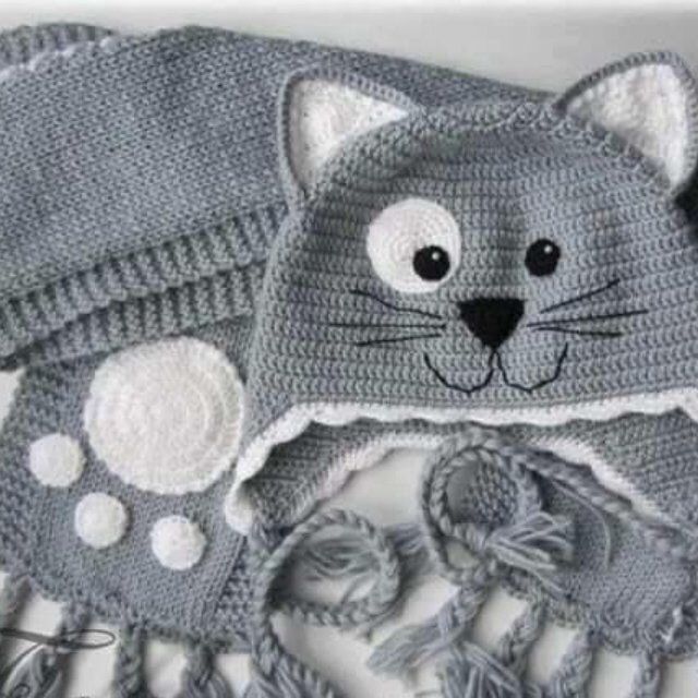 a crocheted cat hat and scarf