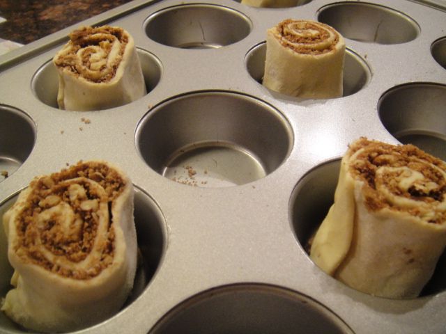 some kind of food that is in a muffin tin