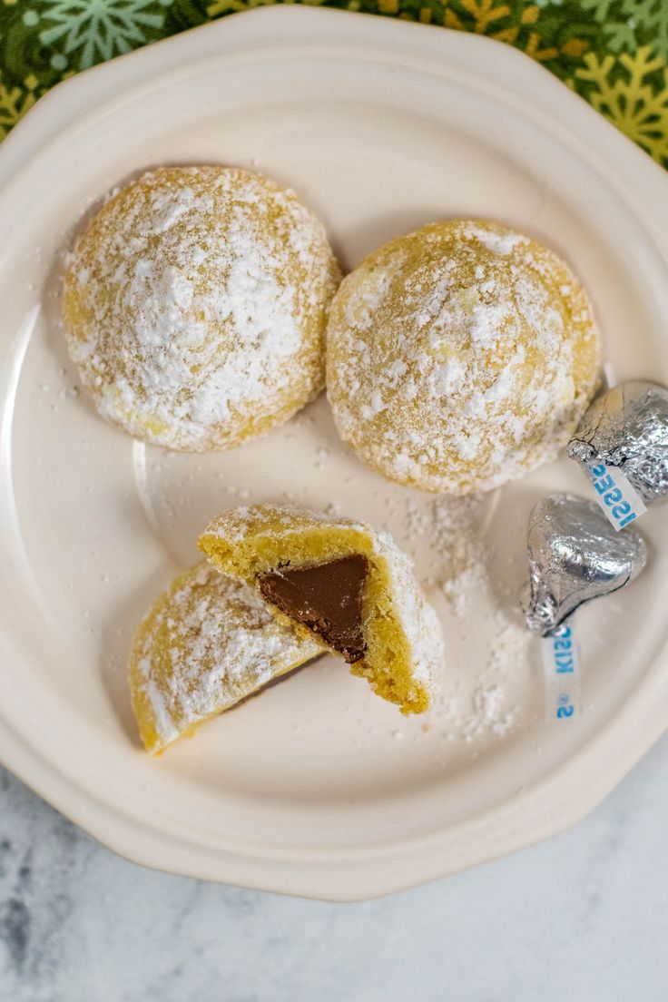 These Secret Kiss Cookies are powdered sugar-covered cookies that look like little snowballs! The buttery dough is wrapped around a chocolate Kiss for a sweet surprise in the center. Secret Kiss Cookies, Pillow Cookies, Upstate Ramblings, Best Christmas Cookie Recipe, Christmas Cookie Recipe, Kiss Cookies, Best Christmas Cookies, Kisses Chocolate, C Is For Cookie