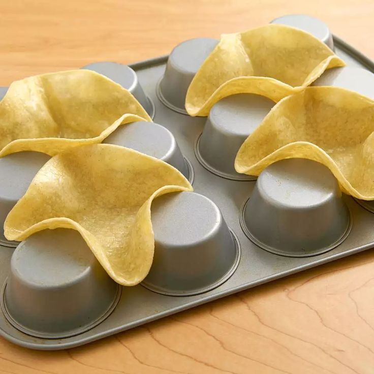 several pieces of food sitting on top of a pan