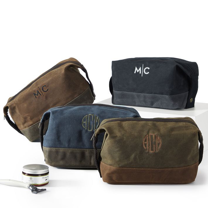 three personalized cosmetic bags with monogrammed initials