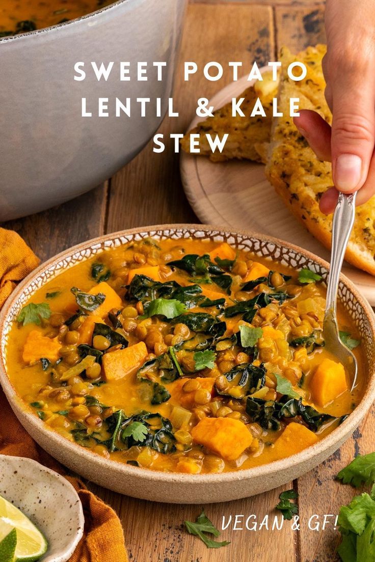 a bowl of sweet potato lentil and kale stew with a spoon in it