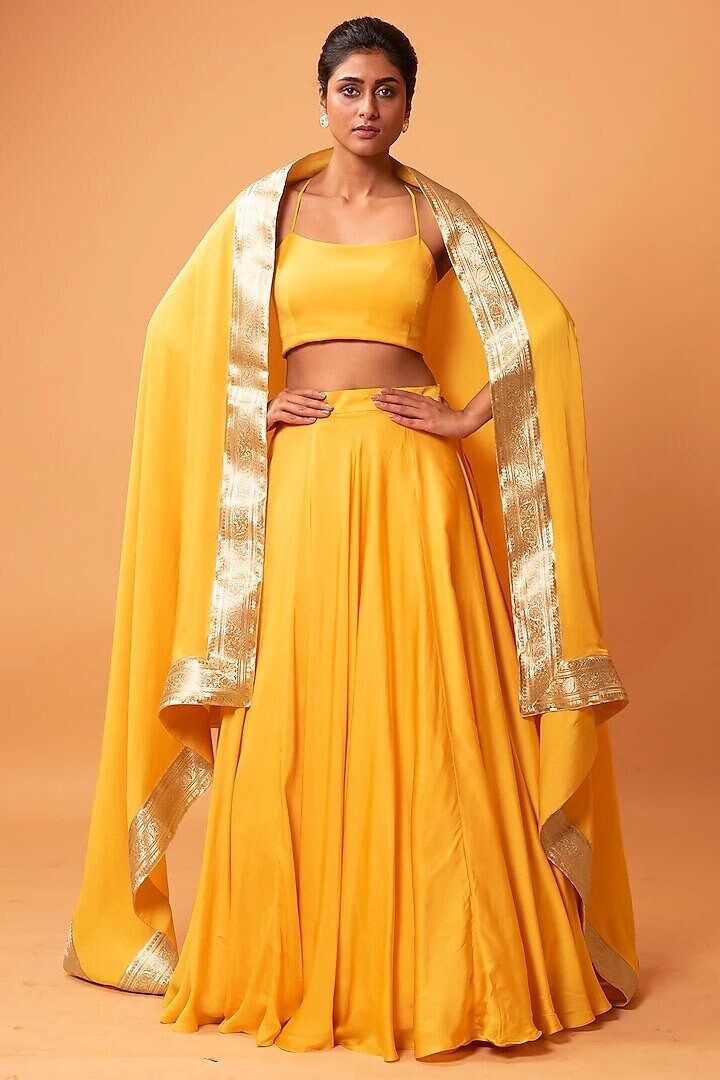 Mustard Yellow Plain Lehenga Set with Dupatta Featuring a Mustard Yellow  Plain l lehenga in satin organza base with Gota Patti. It is paired with a matching blouse, dupatta. This product will be shipped to you after 1-2 weeks from the date of order placed. Custom made orders are not returnable. NOTE: Visual Samples on website may differ slightly from actual product due to light & effects during photography (Length & Breadth have 1 n 1.5 inches +/-). NOTE : Before placing order ,pls confirm product n color availability on +91 7903893945 & +91 8447750028(WhatsApp) NOTE : For Wholesale Order MOQ is 5 Pieces of any color/Pattern contact on +91 7903893945 & +91 8447750028(WhatsApp) Lehenga Haldi, South Asian Wedding Dress, Plain Lehenga, Dress Party Wear, Berry Dress, Haldi Outfit, Yellow Lehenga, Asian Wedding Dress, Lehenga Wedding