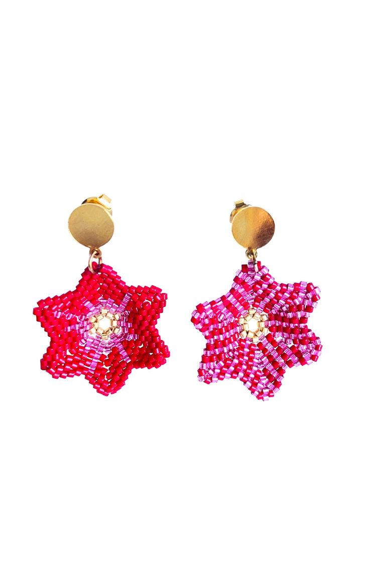 These asymmetrical red-pink earrings have a strong aesthetic. One is completely symmetrical, the other is more whimsical, with the pink flowing into the red. The symmetrical loop refers to the left brain, which is associated with logical reasoning. The whimsical loop refers to the right brain, which is associated with emotion. Like all the jewels in the collection, each "flower" is in relief, which gives it the appearance of a real flower. Nayati is a Native American male name. Its sing-song sou Strong Aesthetic, Logical Reasoning, Left Brain, Sing Song, Right Brain, Pink Earrings, Real Flowers, Ear Studs, Jewelry Earrings Dangle